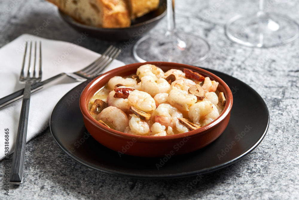 Appetizing spicy prawn dish in bowl in restaurant Appetizing spicy prawn dish in bowl in restaurant