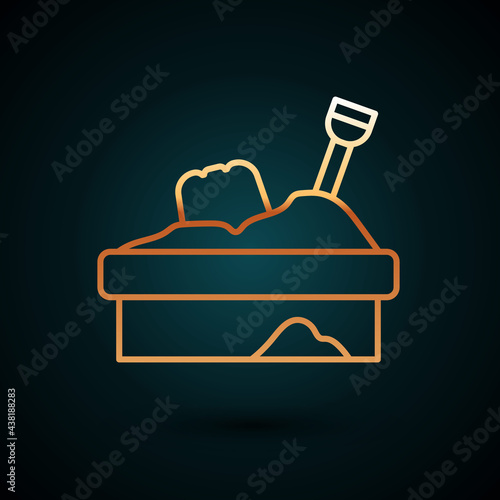 Gold line Sandbox with sand icon isolated on dark blue background. Vector