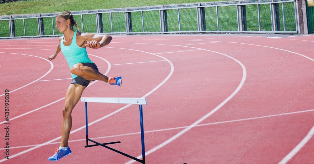 Obraz premium Composition of caucasian female runner over sports field