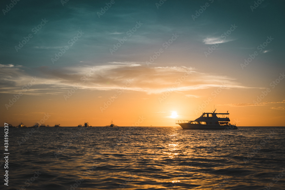 Speedboat in sunset
