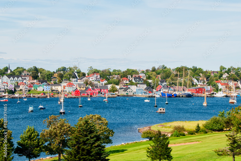 Picturesque village of Lunenburg Nova Scotia Canada taken from a park across from the harbor