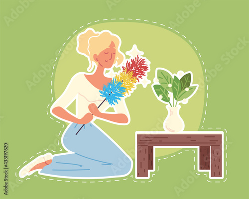 cleaning woman with duster