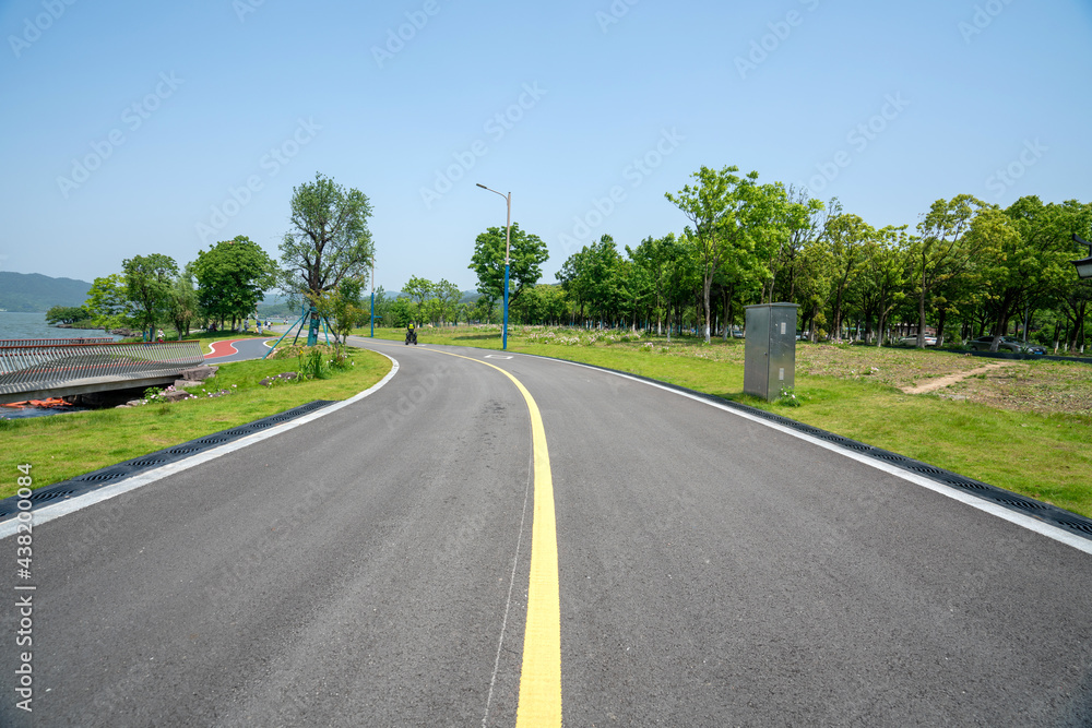 The lush trees and highways outdoors The lush trees and highways outdoors