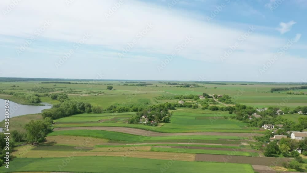 Countryside aerial view with farms, fields and pastures in summer Countryside aerial view with farms, fields and pastures in summer