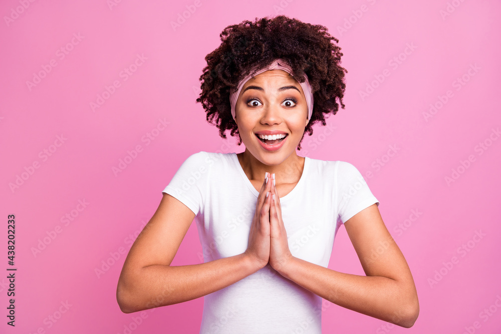 Portrait of brunette optimistic lady hand hold wear white t-shirt hairband isolated on pastel pink background Portrait of brunette optimistic lady hand hold wear white t-shirt hairband isolated on pastel pink background