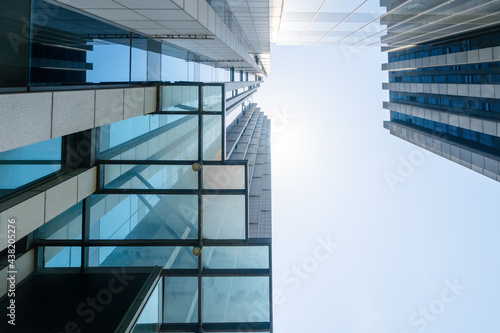 Looking Up Blue Modern Office Building