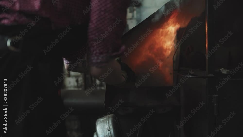 blacksmith girl working in her workshop blacksmith girl working in her workshop