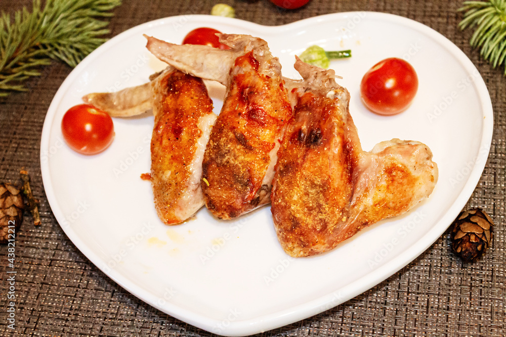 Juicy chicken wings with crispy crust close-up