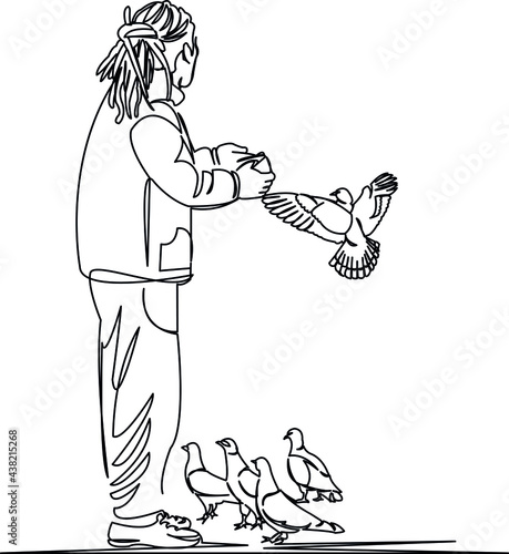 male feeding pigeons