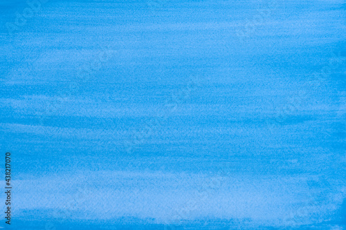 Abstract Hand painted blue watercolor on paper texture background.