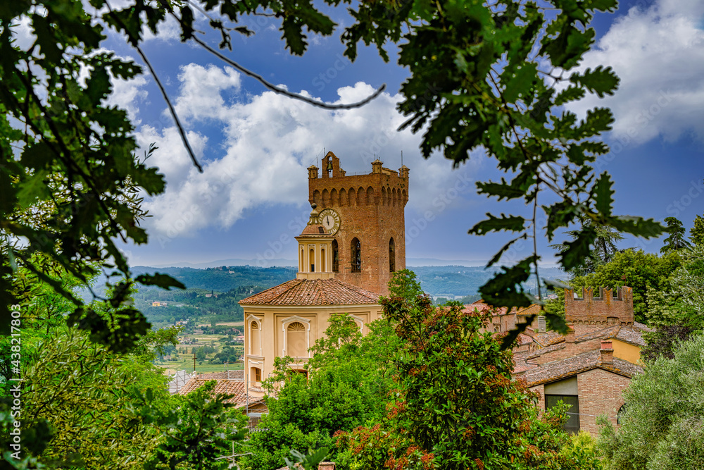 View on the bell tower of the Duomo and the church of S.S. Crucifix in San Miniato Tuscany Italy