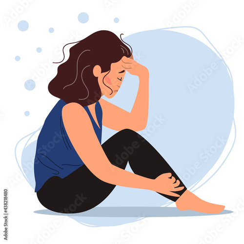 Tired woman sitting on the floor. Concept of emotional burnout or mental disorder. Colorful flat illustration in cartoon style.