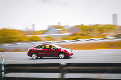 Red Car in motion