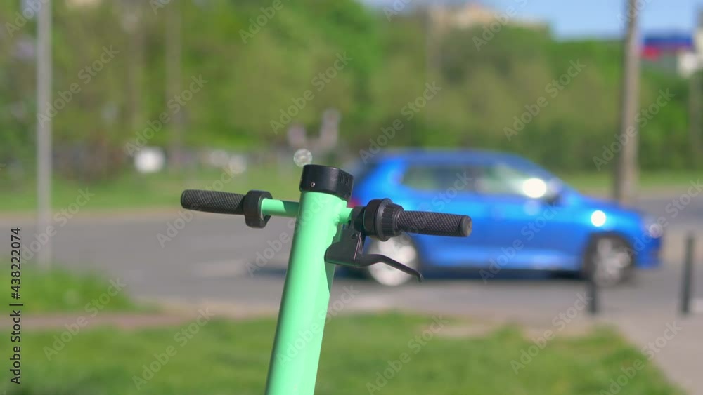 Scooter on the city street in 4k slow motion 60fps Scooter on the city street in 4k slow motion 60fps