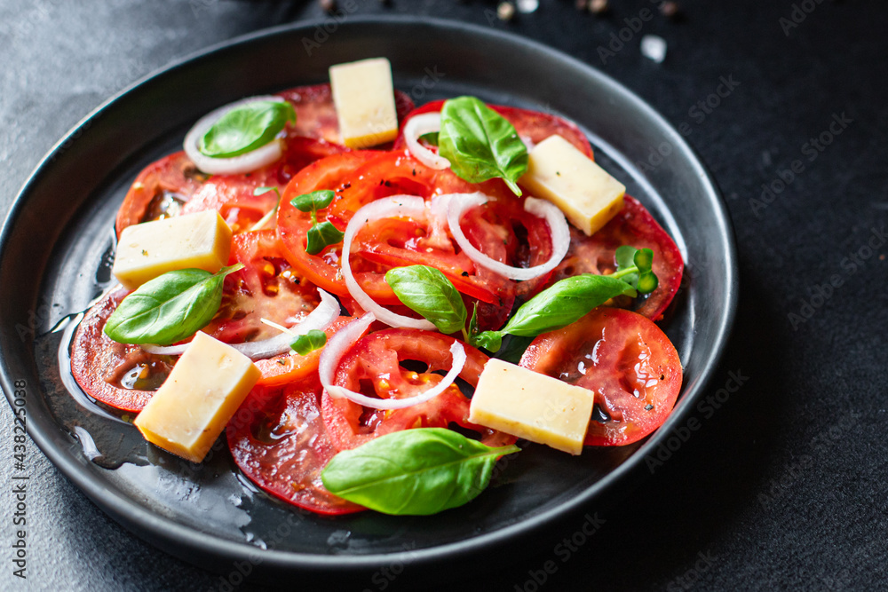 tomato salad and cheese veggie vegetable basil on the table healthy food diet meal snack copy space background rustic. top view vegetarian food tomato salad and cheese veggie vegetable basil on the table healthy food diet meal snack copy space background rustic. top view vegetarian food