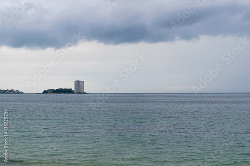 View of the island of Toralla during the day with a stormy sky. Vigo © Chris DoAl
