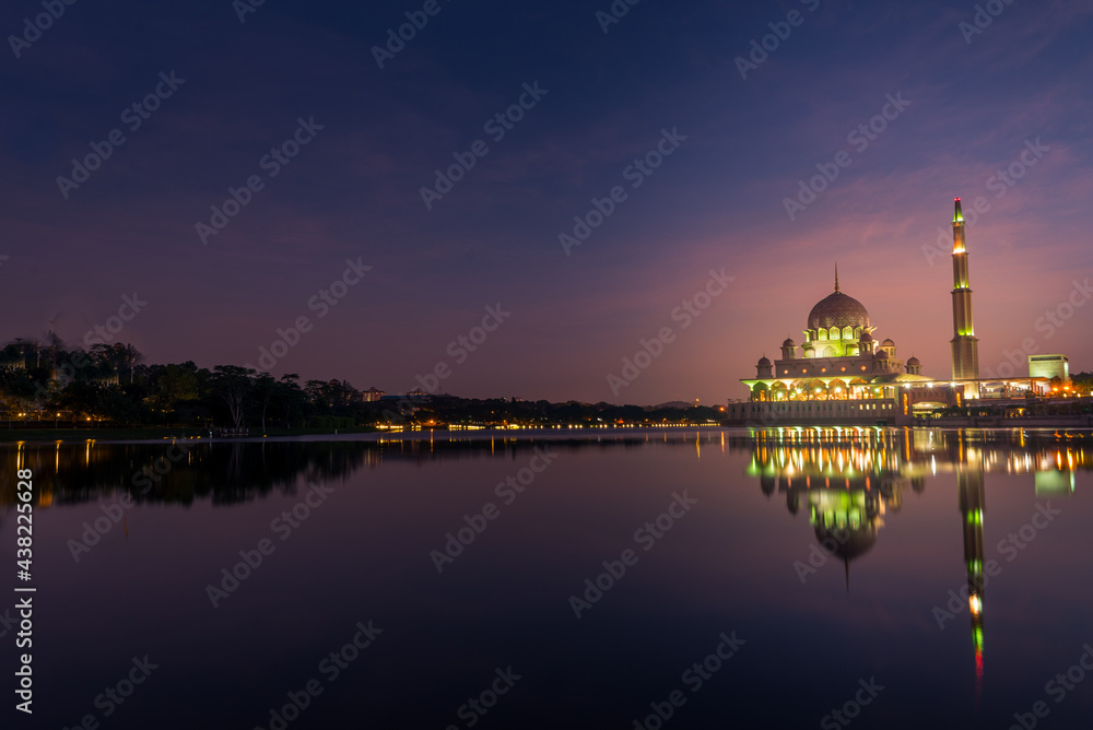 mosque at night by the lake