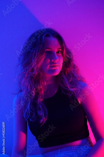 teenager in blue with neon ights © carmen ramon
