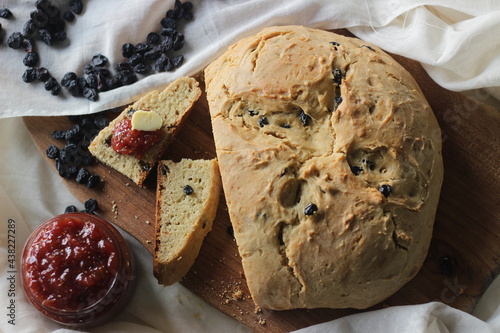 Slices of home baked Irish soda bread with raisins. A quick bread to make at home with out yeast. Served with fig jam. photo