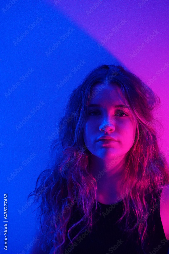 teenager in blue with neon ights teenager in blue with neon ights