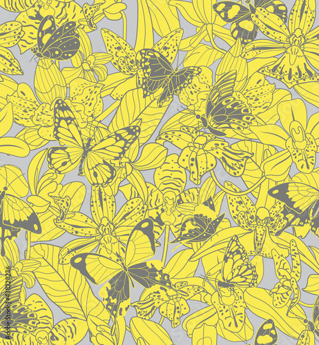 Yellow big and small butterflies on a gray background seamless pattern. Vector illustration with insects. Color of year