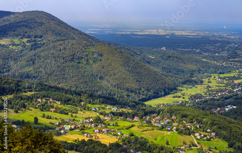 Fototapeta Naklejka Na Ścianę i Meble -  Panoramic view of Beskidy Mountains surrounding Miedzybrodzkie Lake and Porabka town seen from Gora Zar mountain near Zywiec in Silesia region of Poland
