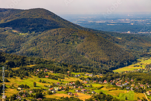 Fototapeta Naklejka Na Ścianę i Meble -  Panoramic view of Beskidy Mountains surrounding Miedzybrodzkie Lake and Porabka town seen from Gora Zar mountain near Zywiec in Silesia region of Poland