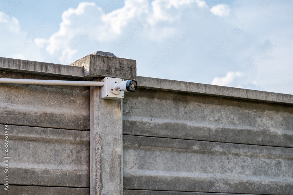 Modern CCTV security camera system install on cement wall Modern CCTV security camera system install on cement wall