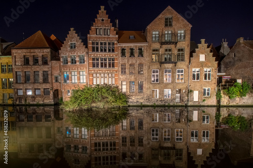 Ghent. Historic District Old houses are reflected in the water. East Flanders, Belgium