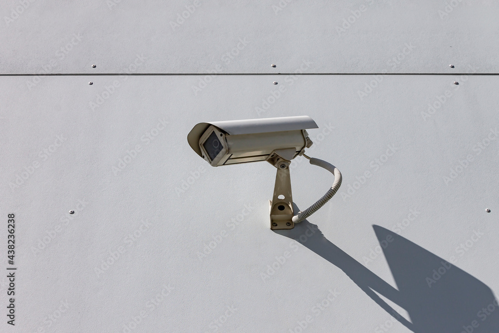 CCTV camera, Videcam, hanging on the wall. Security surveillance video camera install for protect. Home security system photo concept. Anti-theft system. Big brother Digital Eyes. CCTV camera, Videcam, hanging on the wall. Security surveillance video camera install for protect. Home security system photo concept. Anti-theft system. Big brother Digital Eyes.