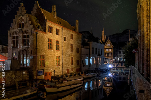 Bruges. Historic District Old houses are reflected in the water. West Flanders, Belgium