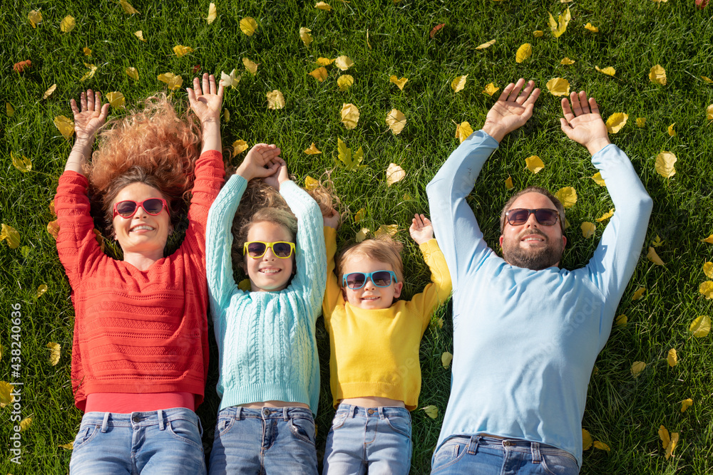 Fototapeta premium Happy family outdoor in autumn