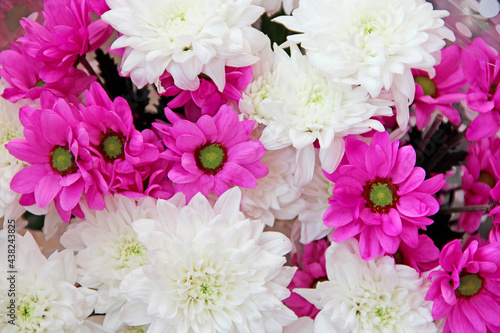 beautifully designed bouquet of white and red chrysanthemums