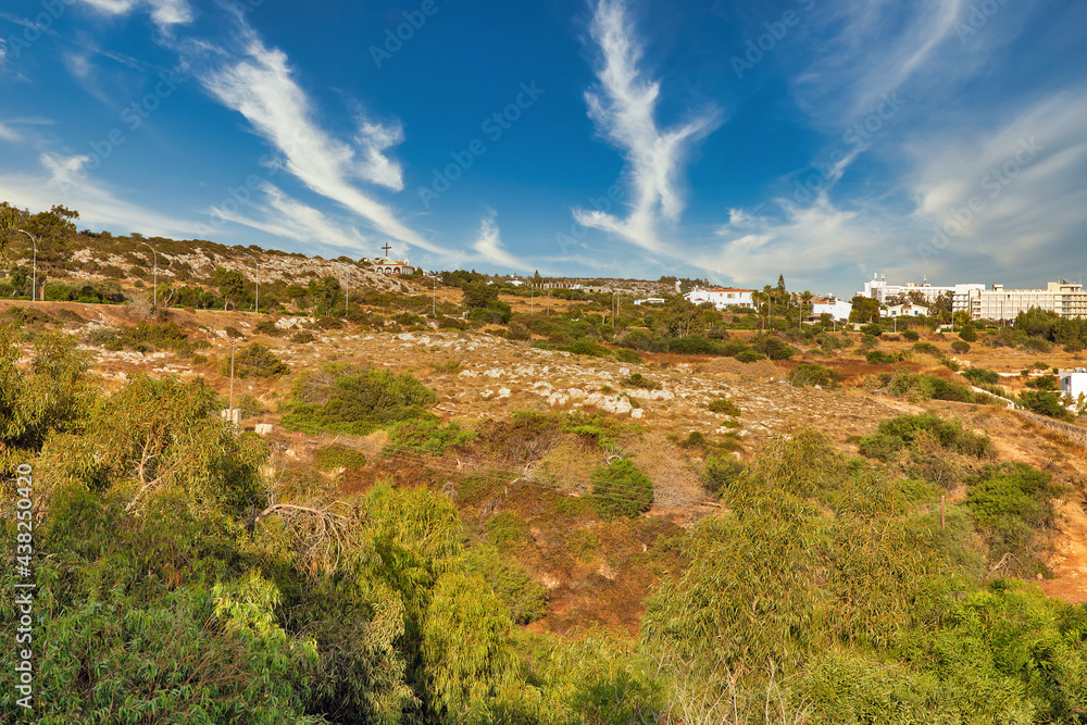 Landscape with gardens and Agios Epiphanios Church. Ayia Napa, Cyprus.