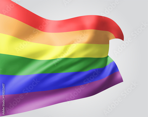 rainbow, vector flag with waves and bends waving in the wind on a white background.