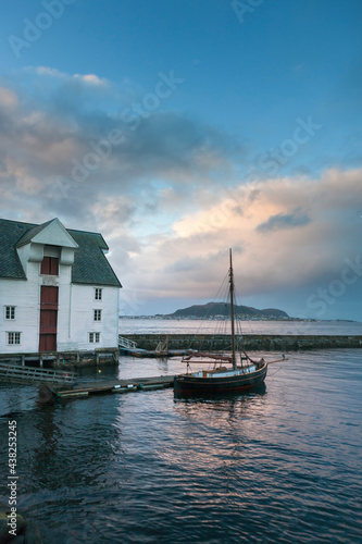 A traditional fishing boat moored at the Fisheries museum, Molovegen, Ålesund, Møre og Romsdal, Norway © Will Perrett
