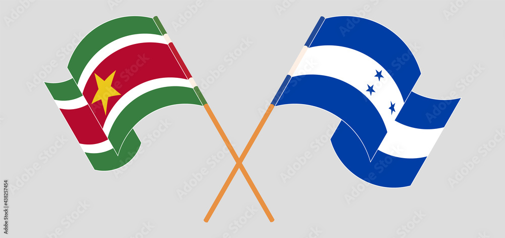 Crossed and waving flags of Suriname and Honduras Crossed and waving flags of Suriname and Honduras