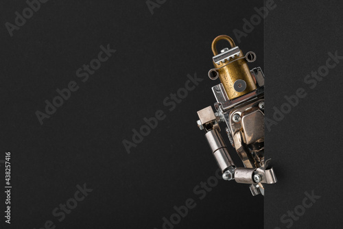 Portrait of a steampunk robot looking around the corner.