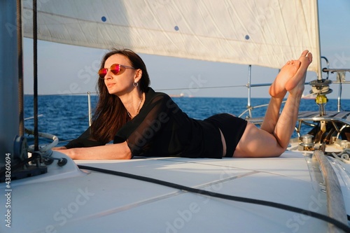 woman on yacht. Girl on the yacht. Beautiful woman. Beautiful woman on yacht.  © Oksana