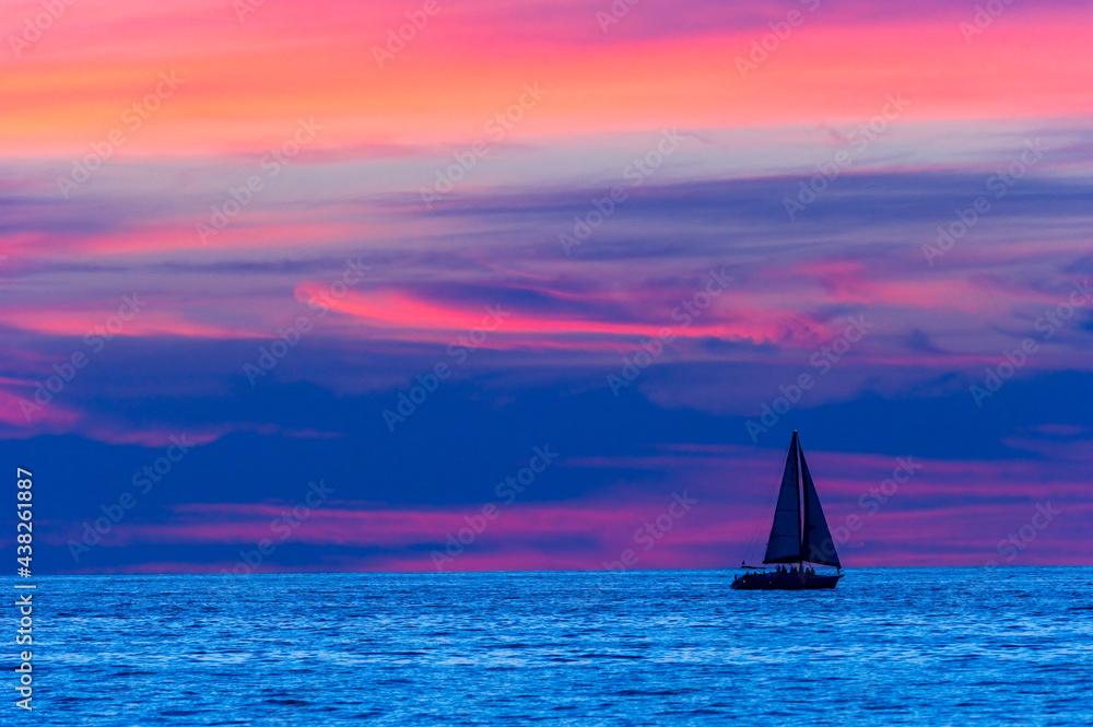 Fototapeta premium Sailboat Sunset Night Sailing Surreal Colors