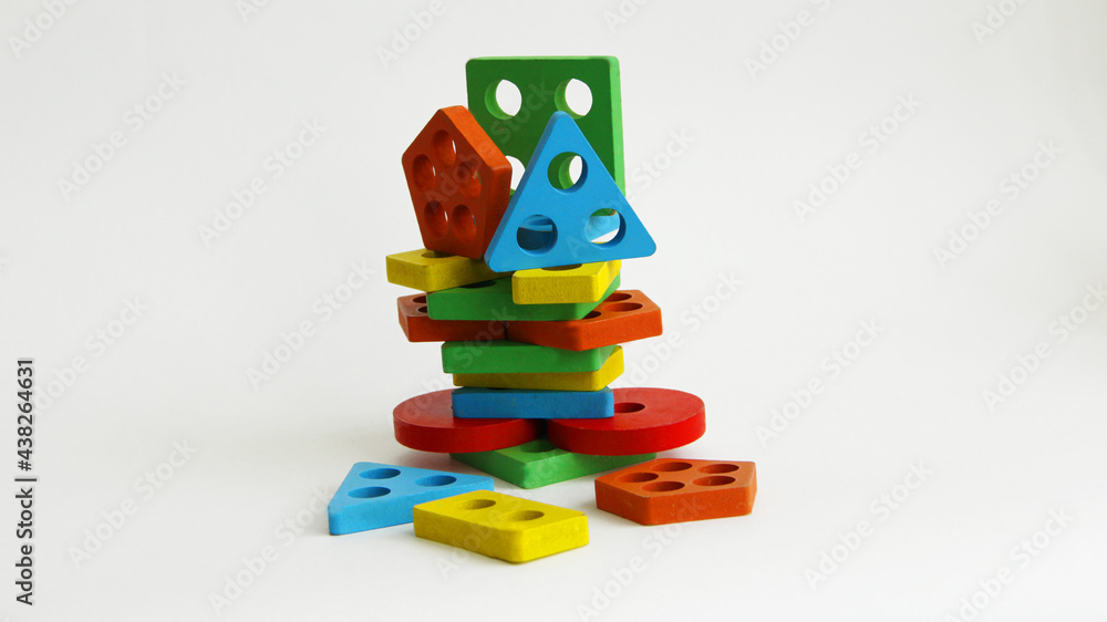 different geometric shapes from toys on a white background. colorful shapes
