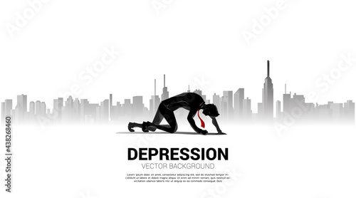 silhouette of businessman crawling in big city background. Concept of feeling depress in big city.