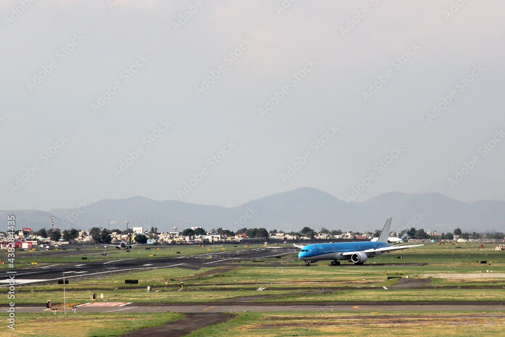 Fototapeta premium Airplane settling on runway to take off or land 