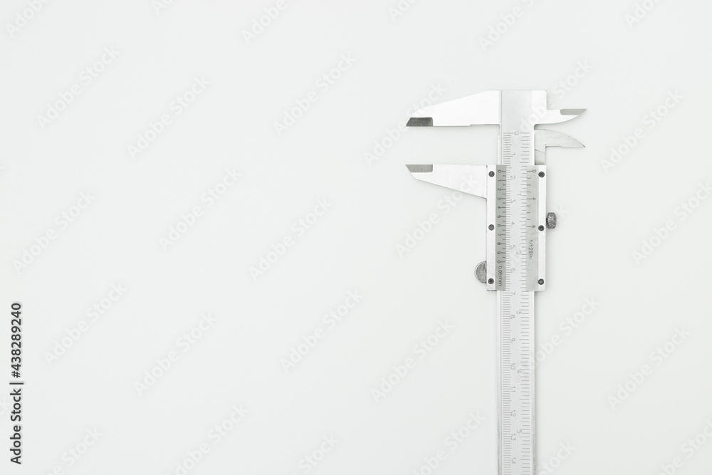 Top view of iron Vernier Calipers on white background and copy space Top view of iron Vernier Calipers on white background and copy space