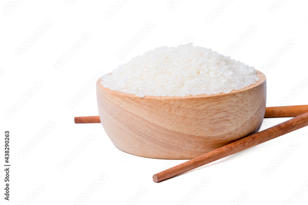 Raw rice japanese in wooden bowl with chopsticks white on background. Raw rice japanese in wooden bowl with chopsticks white on background.