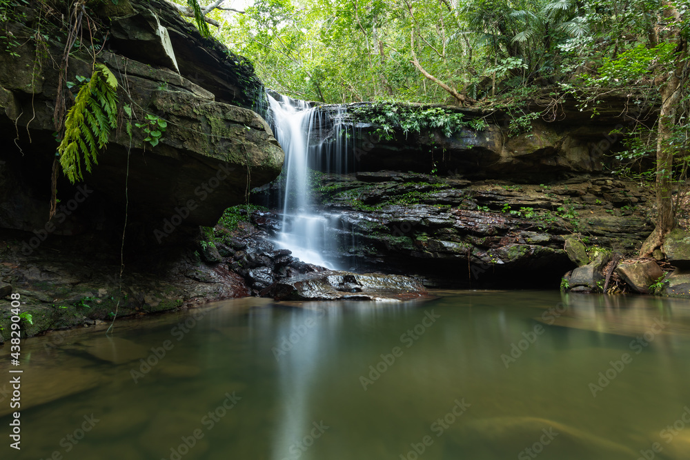 Kura waterfall with its serene atmosphere full of vegetation, refreshing swimming hole with smooth surface. Iriomote Island. Kura waterfall with its serene atmosphere full of vegetation, refreshing swimming hole with smooth surface. Iriomote Island.