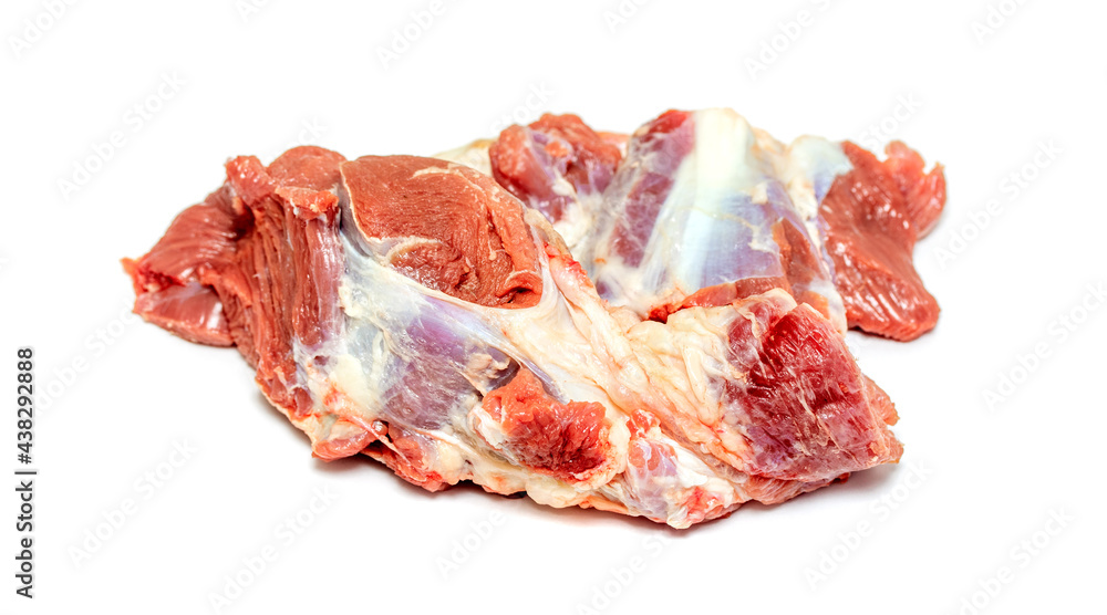 pieces of raw meat on white background