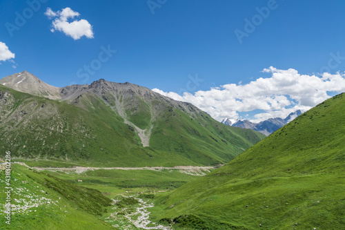 Mountains and grasslands along G217 highway in Xinjiang, China in summer