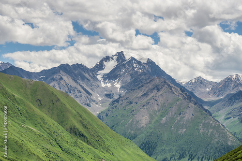 Mountains and grasslands along G217 highway in Xinjiang, China in summer