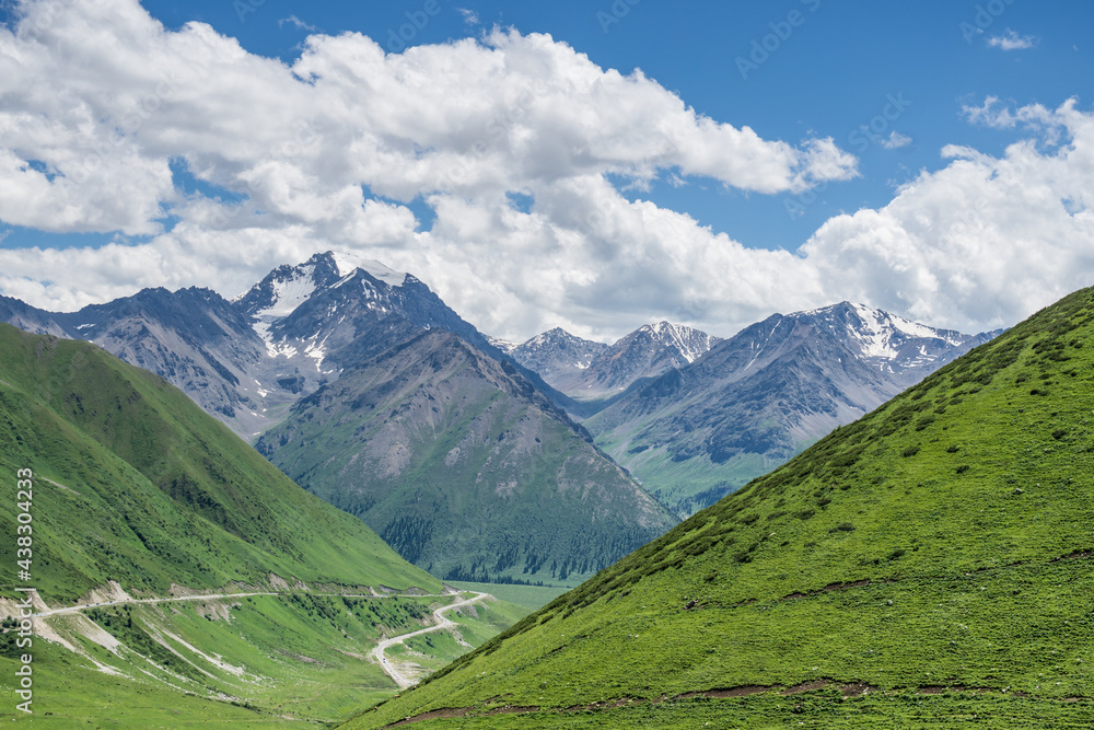 Obraz premium Mountains and grasslands along G217 highway in Xinjiang, China in summer